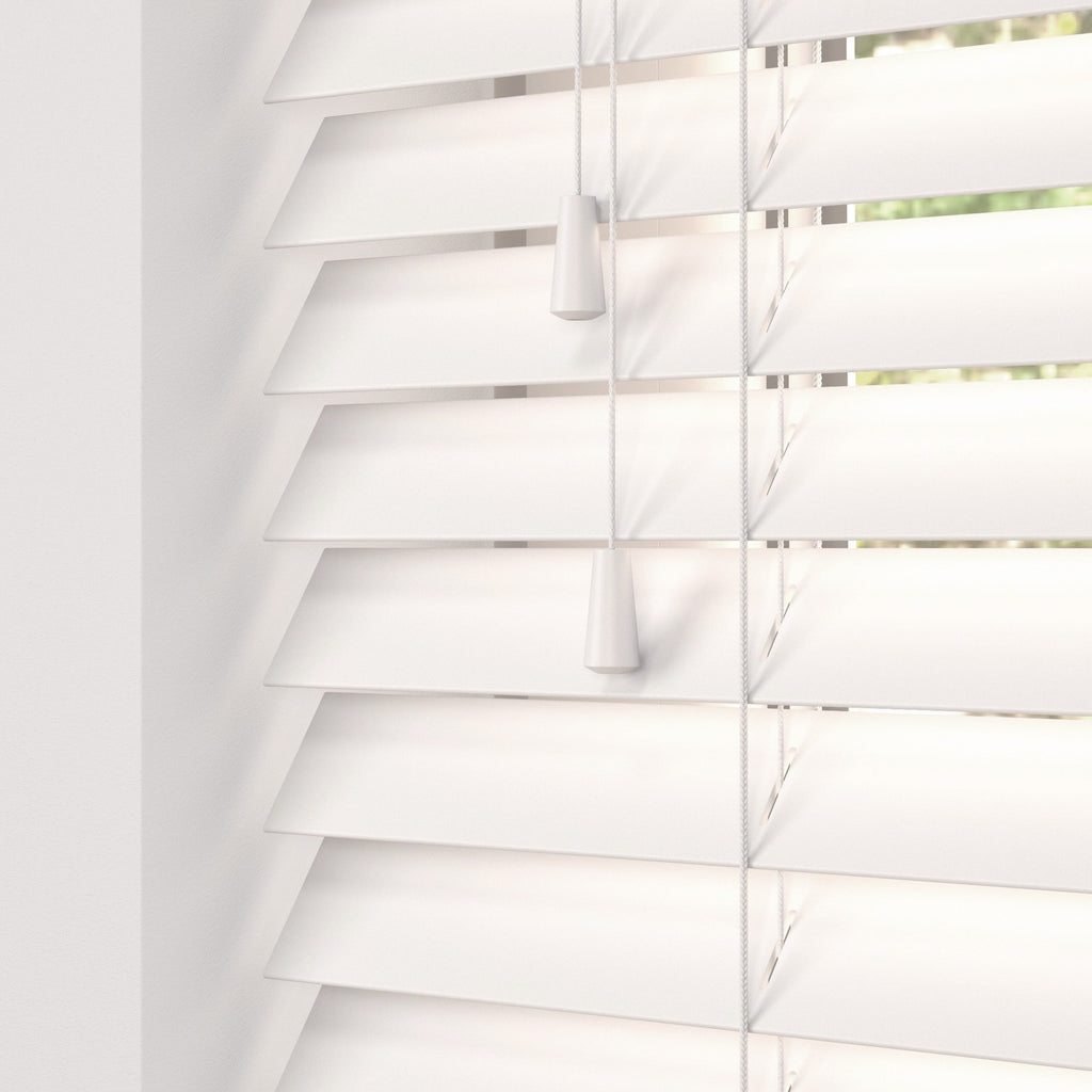 Off White Venetian Blind installed in window